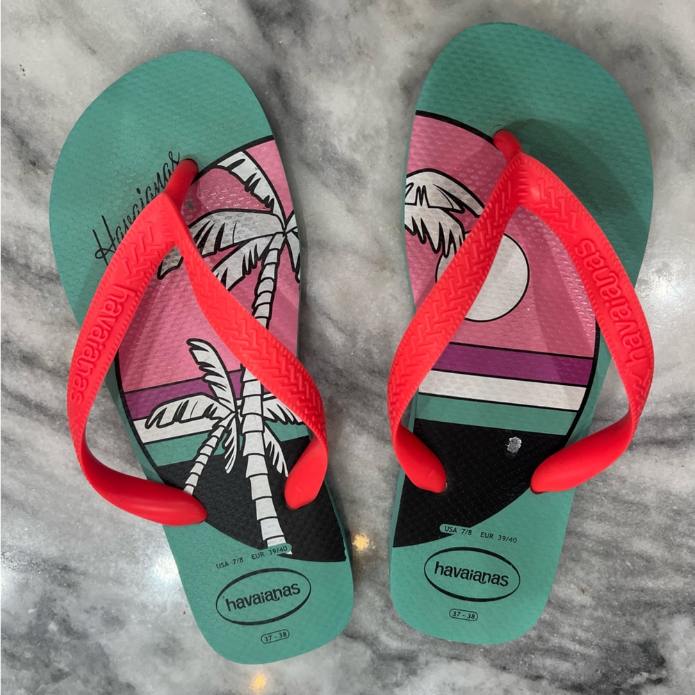 Havianas Teal and Pink Flip Flops.  Barely worn, W 7/8